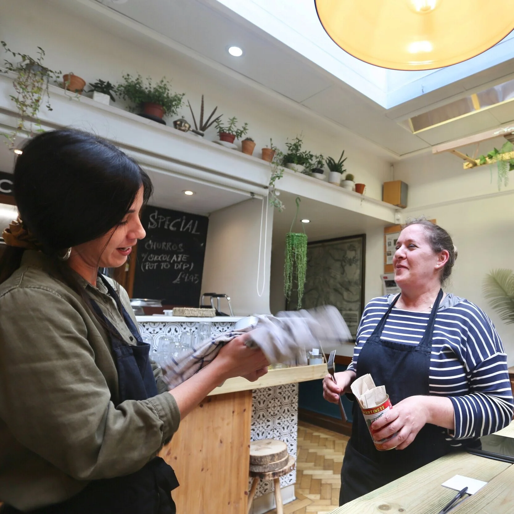 Older local guide image of the Secret Café counter and chalkboard